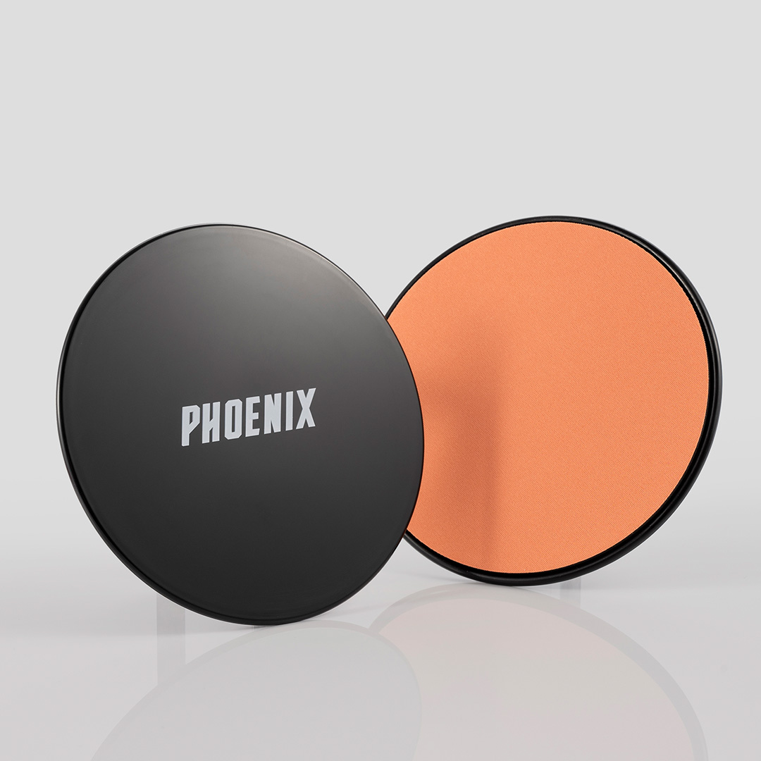 Black and Orange dual sided gliding exercise discs stood up