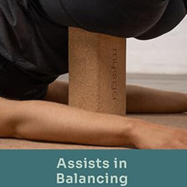 Eco Conscious Cork Yoga Block by Myga. Image shows a lady using the yoga block to assist with balance.