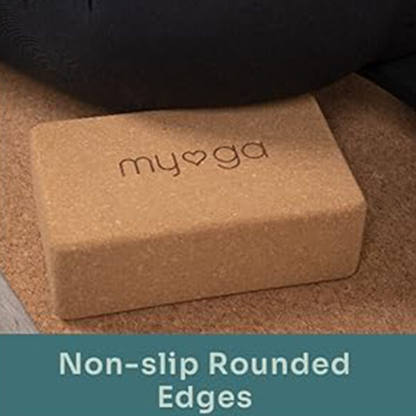 Eco Conscious Cork Yoga Block by Myga. Image shows a lady highlighting the non slip rounded edges