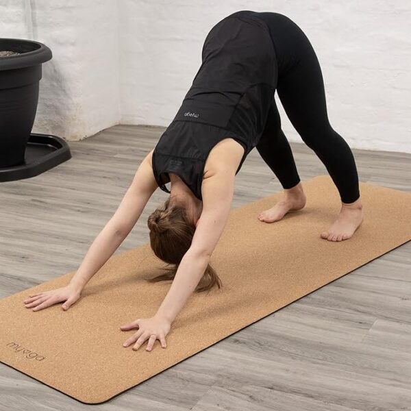 Cork Eco-Friendly Yoga Mat - Lady performing downward dog.