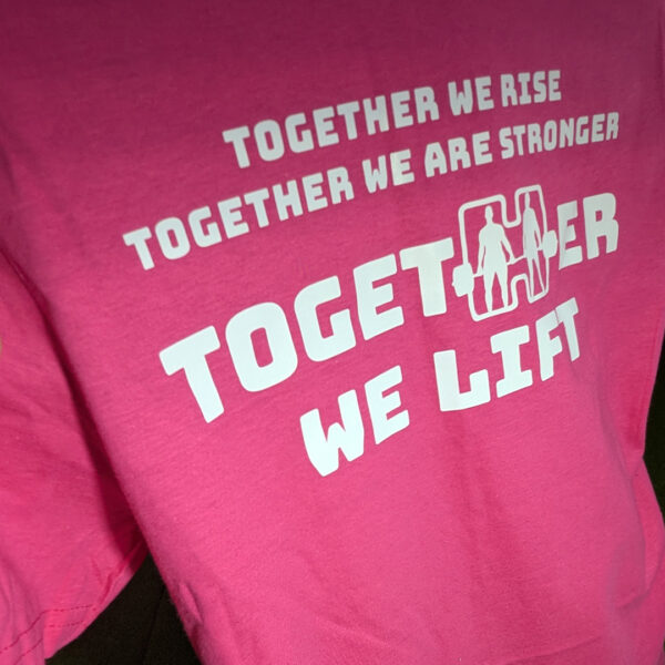 Close up of the rear print on the Pink Together We Lift T Shirt