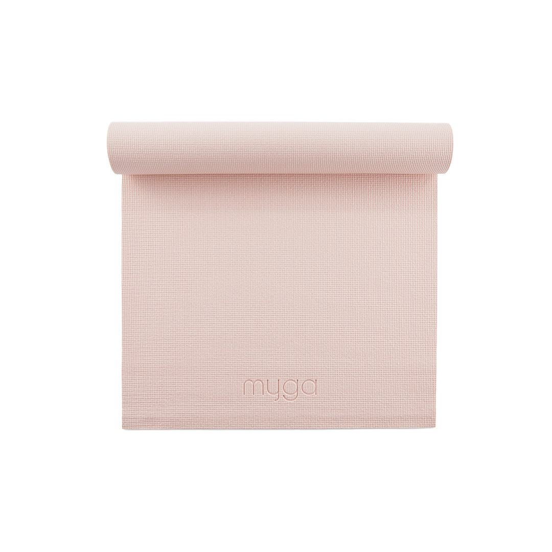 Pink yoga mat for beginners, 4mm Myga mat partially rolled