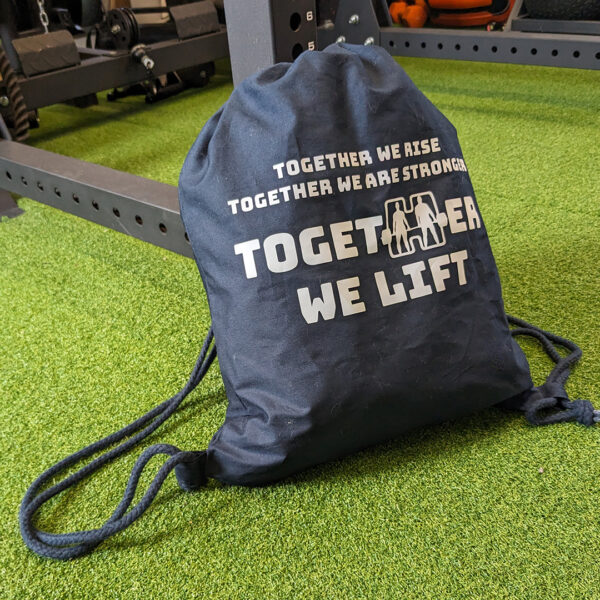 Together We Lift Drawstring bag