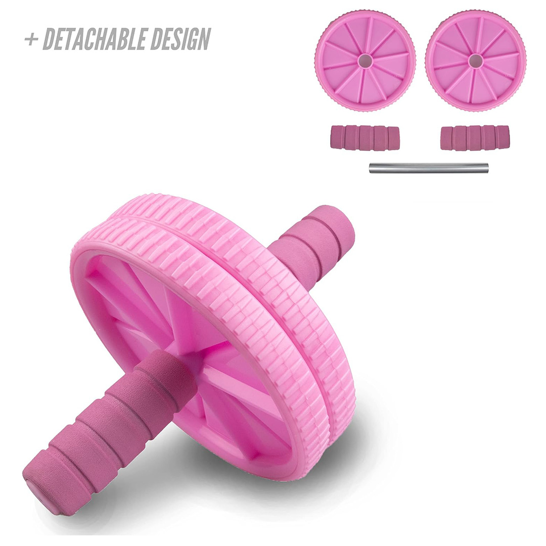 Detachable pink ab roller showing two wheels, foam handles and the central support bar before assembly.