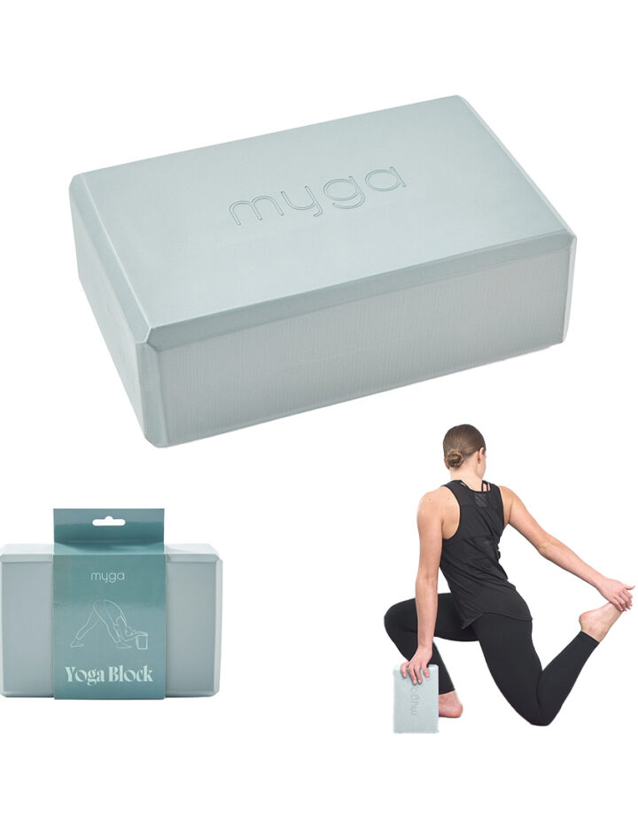Teal yoga block used for stretching and support in yoga pose