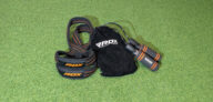 RDX figure 8 lifting straps and skipping ropes displayed on gym floor, representing RDX weightlifting and boxing accessories range.