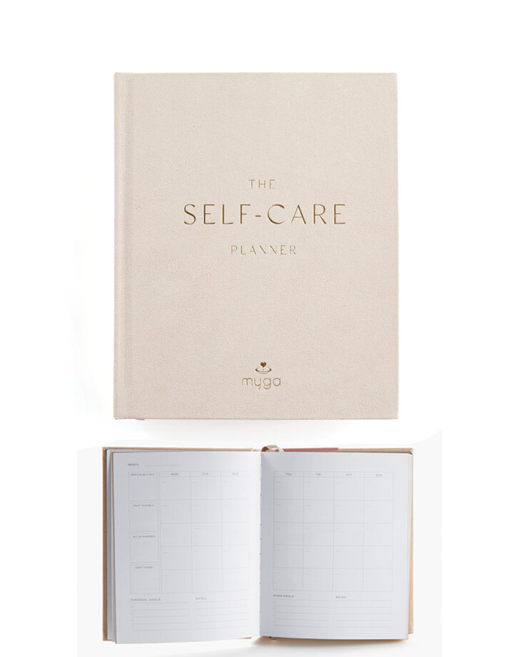 Hardback Self-care A5 planner journal with gold embossed cover and structured weekly wellbeing planning pages