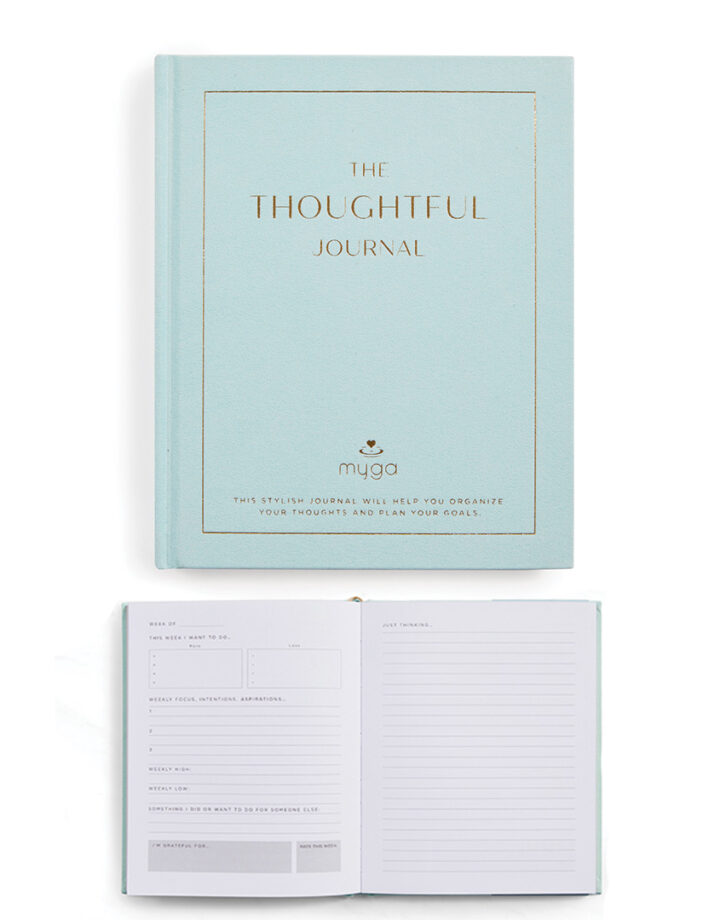Thoughtful journal with structured reflection pages for gratitude, goals, and weekly personal development