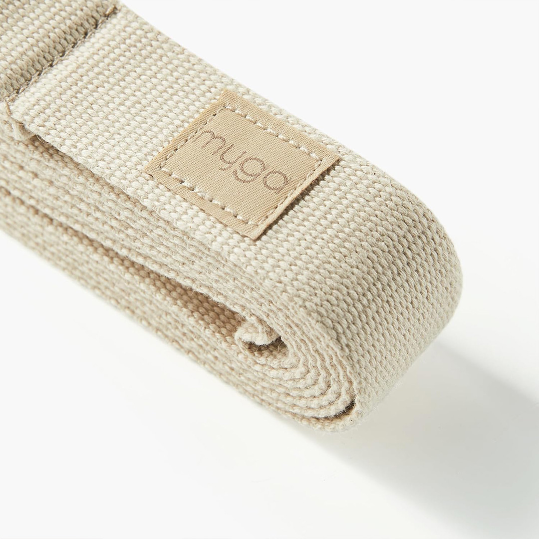 Close up of the sand coloured yoga strap