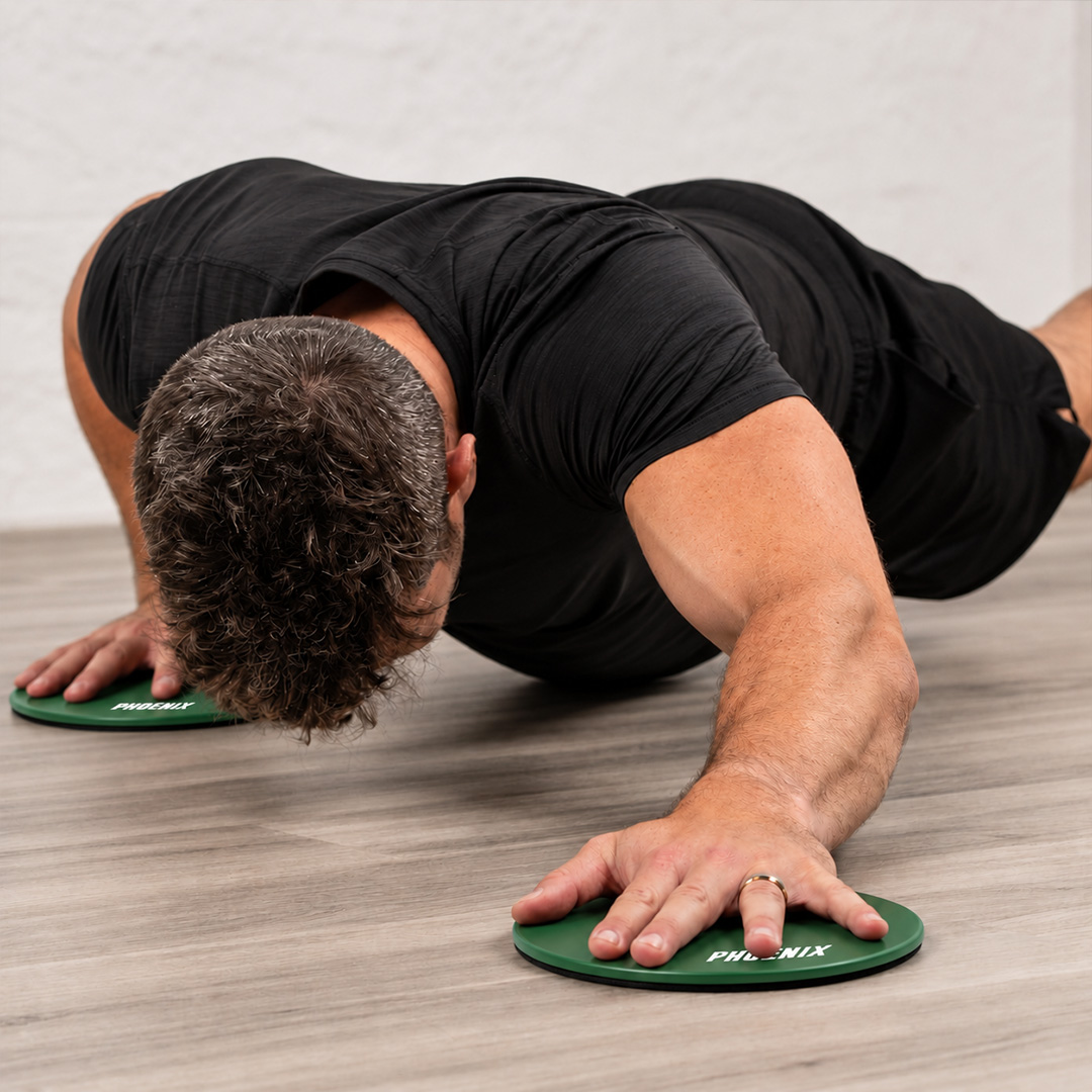 Green gliding discs used for sliding upper body exercise